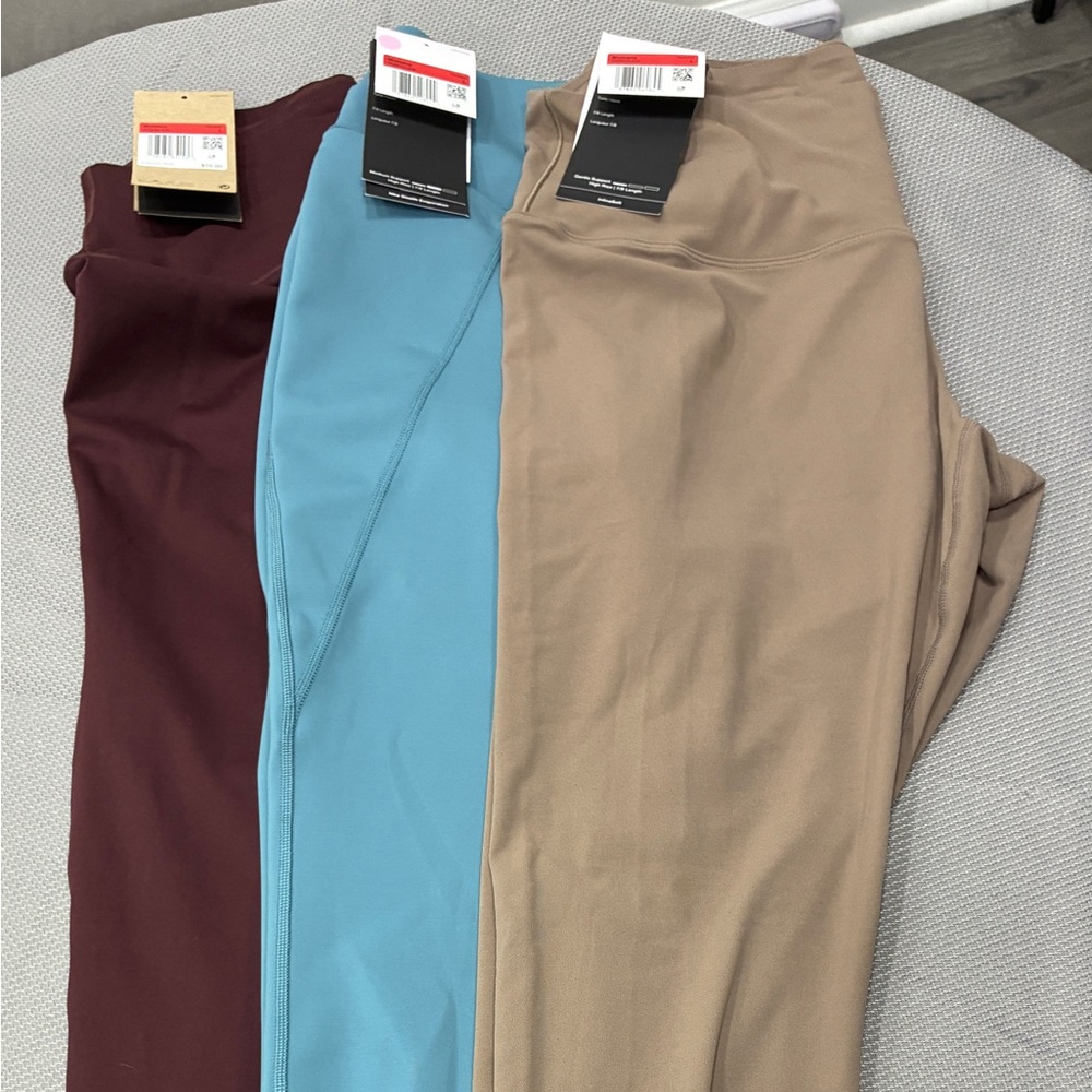Nike All in Motion Leggings Set in Maroon, Teal, and Beige-size large